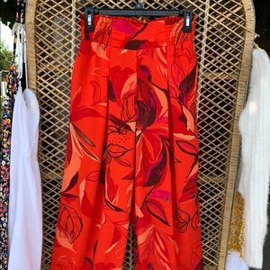 Red floral print with wide leg pants style. High rise